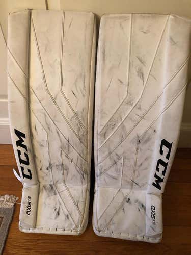 White Used Junior 28+1" CCM Axis 1.5 Goalie Leg Pads