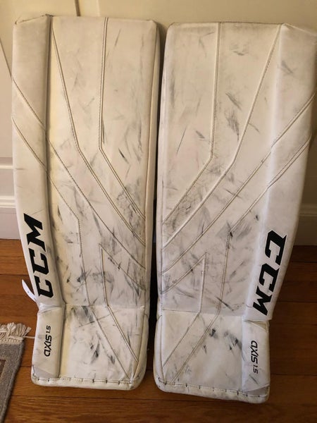 White Used Junior 28+1" CCM Axis 1.5 Goalie Leg Pads