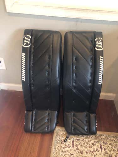 Used 31" Warrior Ritual G4 Goalie Leg Pads