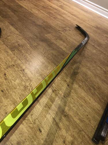 Division One: Intermediate Right Handed Mid Pattern Pro Stock Supreme Ultra Sonic Hockey Stick