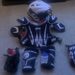 Youth lacrosse helmet , chest protector , elbow pads and gloves for the little guys