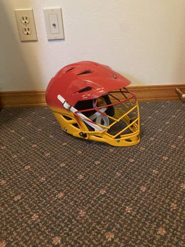Warrior Evo Lacrosse Helmet Red and Yellow