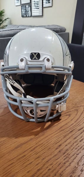 Used white Youth Large Xenith X2E Helmet with facemask and chinstrap