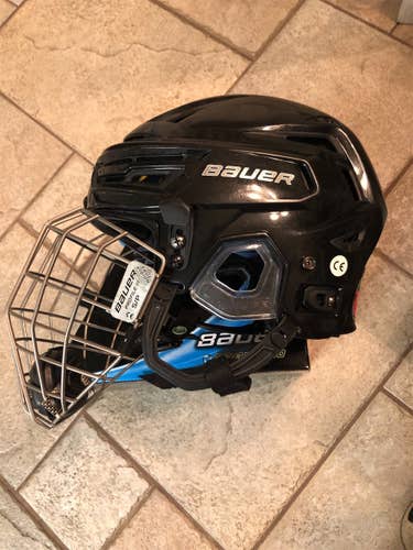 Black Used Medium Bauer Re-Akt 150  Helmet