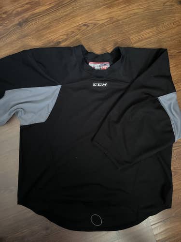 Black Used 58G Goalie Cut CCM Pro Stock Jersey
