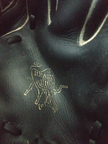 Black Used High School/College Rawlings Right Hand Throw Heart of the Hide Baseball Glove