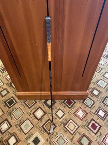 Used 4 iron Stiff Flex Graphite Shaft