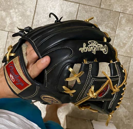 11.5 custom Rawlings Pro model Pro preferred black and Gold Laces