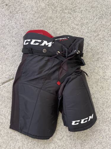 Black Junior Medium CCM JetSpeed FT350 Hockey Pants