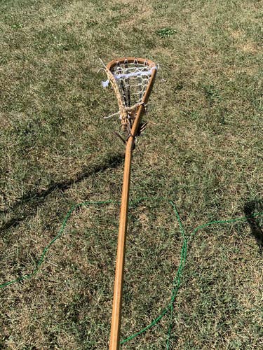 traditional wooden lacrosse stick