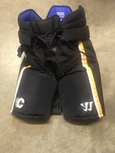 Almost New Medium Warrior Pro Stock Hockey Pants