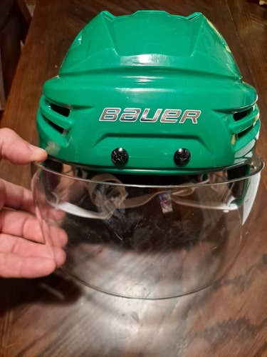 Green Used Medium Bauer Re-Akt Helmet with visor