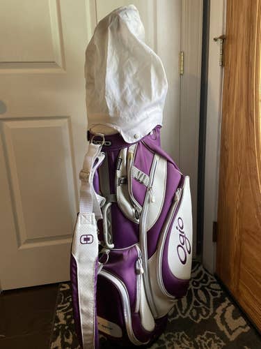 Purple and white Ogio cart bag with snap on rain cap
