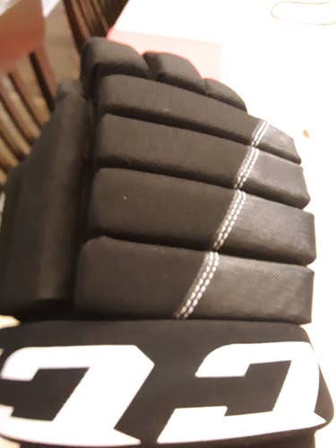 Used CCM Tacks 4 Roll Gloves 14"