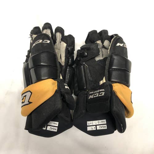Used 14" CCM HG42 gloves - WHL (UG648)