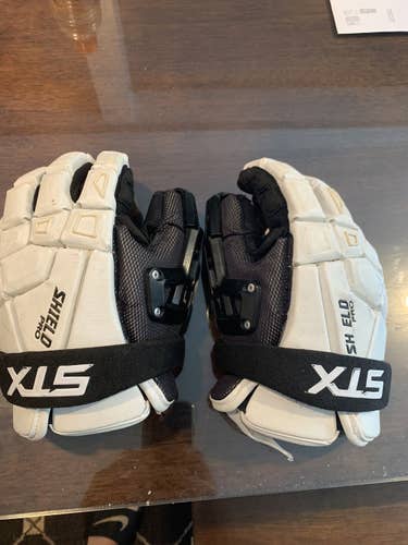 White Used STX Shield Pro Goalie Gloves 12"