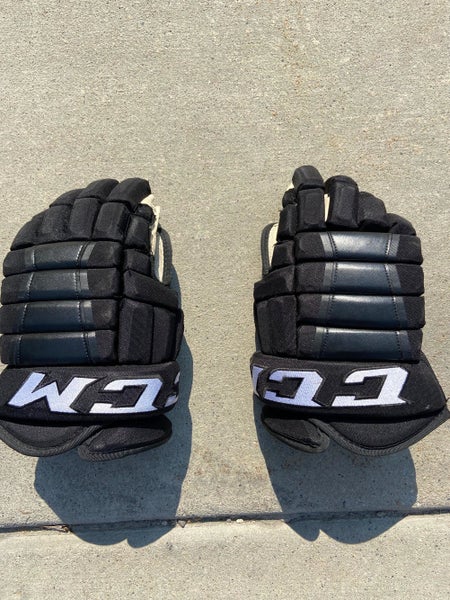 Black Used Senior CCM HG97 Gloves 14" Pro Stock