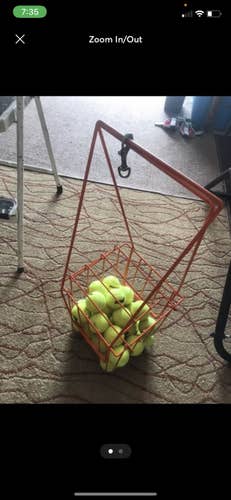 24 tennis balls with rack