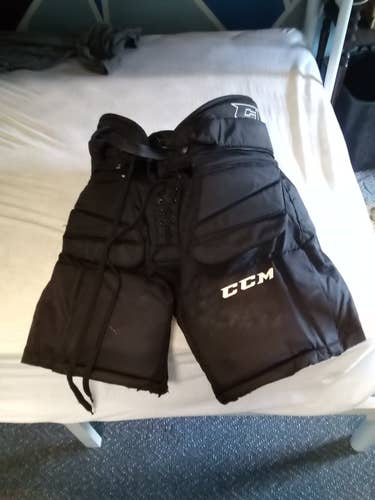 Black Intermediate Used Medium/Large CCM Goalie Pants.