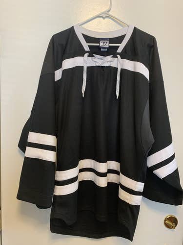 Black And White New Medium Warrior Hockey Jersey
