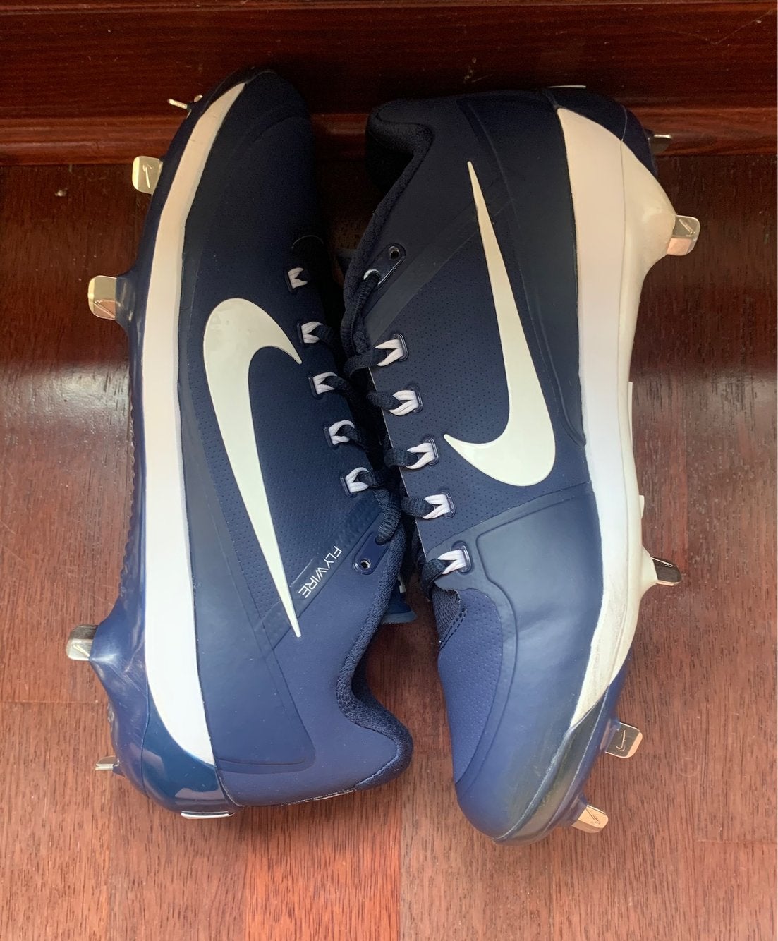 navy blue nike cleats