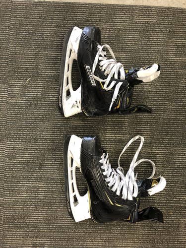Junior Bauer Regular Width  Size 4 Supreme 2S Pro Hockey Skates