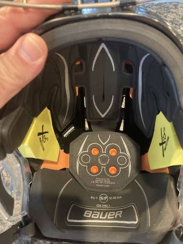 Black Used Small Bauer Re-Akt 75 Helmet with cage