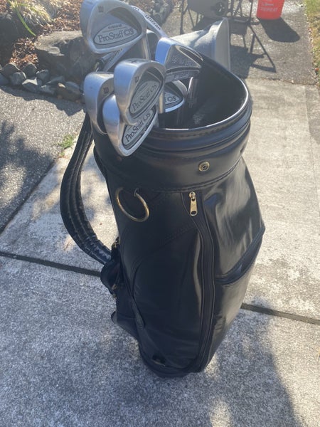 Vintage Golf Bags with Collection of Clubs