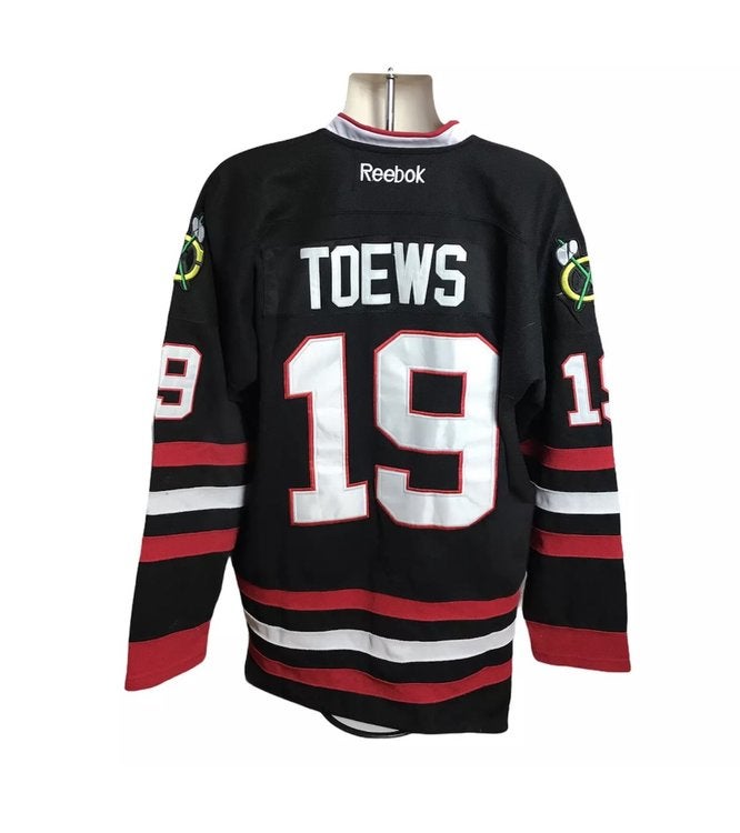 blackhawks jersey with fight strap