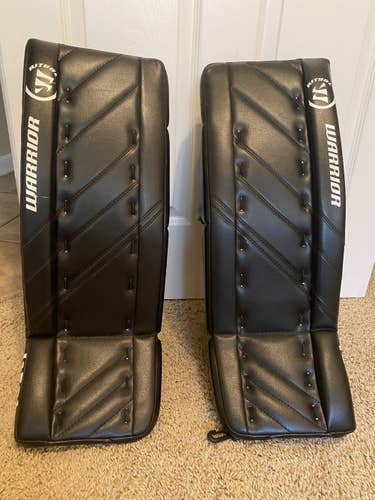 Black Used Junior 24" Warrior Ritual G4 Goalie Leg Pads