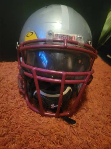 Large Riddell Revolution Helmet/ Oakley smoke visor