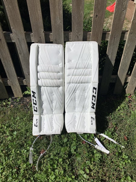 White Intermediate 30 +1 CCM Extreme Flex E4.9 Goalie Leg Pads