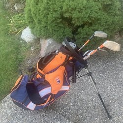 US Kids 51” golf clubs and bag