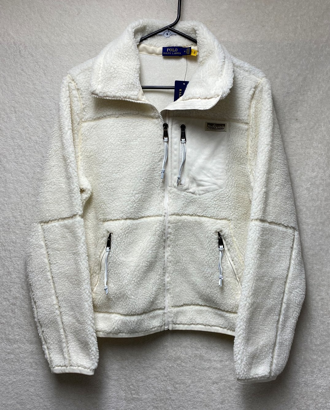 cream polo jacket