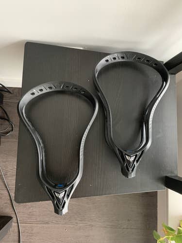 Two Black Warrior Unstrung Evo 5 Heads - One New & One Lightly Used