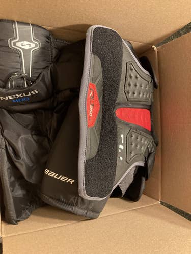 Used Junior Medium CCM U+ Shoulder Pads