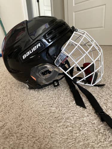 Black Used Medium Bauer  Re-Akt 75 Helmet With Cage