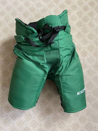 North Dakota University Green Senior Used Medium CCM HP35 Hockey Pants Pro Stock