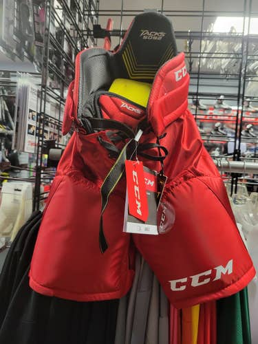 New CCM 5092 hockey pants junior small red.  Very similar to 9060.