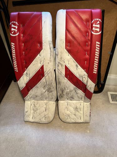 Used 32" Warrior Ritual G4 INT Goalie Leg Pads