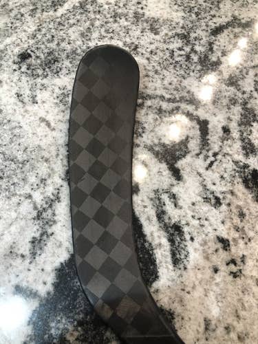 Used Intermediate CCM Right Handed Ribcor Trigger 5 Pro Hockey Stick Mid Pattern