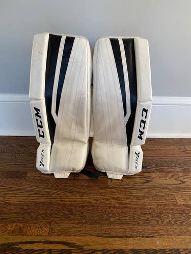 White & Black Used Youth 22" CCM YTFlex Goalie Leg Pads