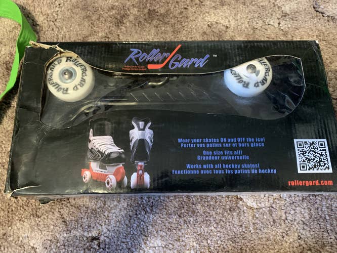 Two pair of RollerGards (black-new, blue-very slightly used)