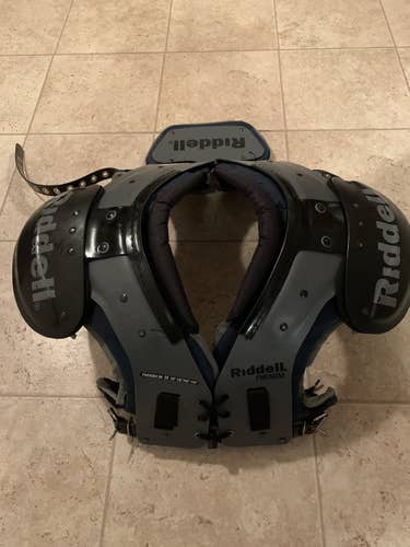 Medium Riddell Shoulder Pads; (2) Nike Pro Combat Girdle