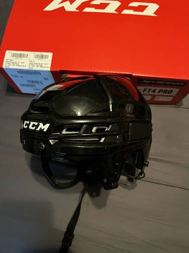 Black Used Medium CCM  Tacks 910 Helmet
