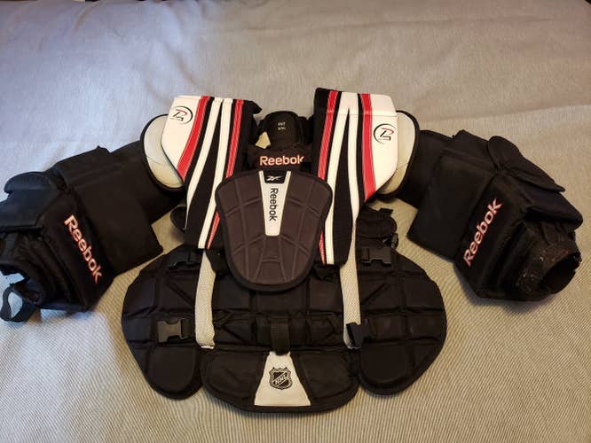 Intermediate Used Small Reebok Goalie Chest Protector and Reebok goalie pants