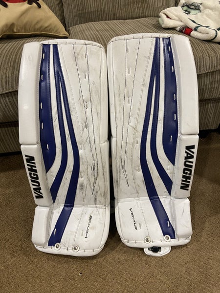 White/blue Used Junior 24" Vaughn Ventus SLR Jr Goalie Leg Pads