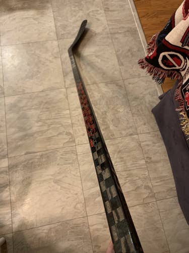 Senior Right Handed Mid Pattern Pro Stock Ribcor Trigger 5 Pro Hockey Stick