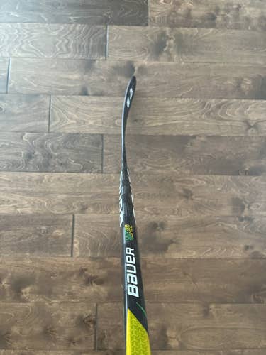 Used Intermediate Bauer Left Hand Supreme UltraSonic Hockey Stick Mid Pattern