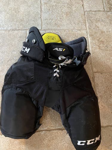Used Black Junior Large CCM AS1 Hockey Pants